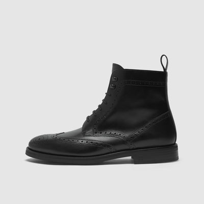 Men's boots with perforated pattern